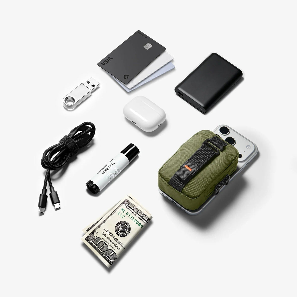 Collection of small electronic devices and accessories on a white background