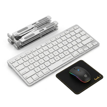 A wireless computer setup set on a white background, featuring a slim white keyboard, a matching white mouse, a black mouse pad with a gold Touch 3 logo, and a stack of silver metal butterfly wings.