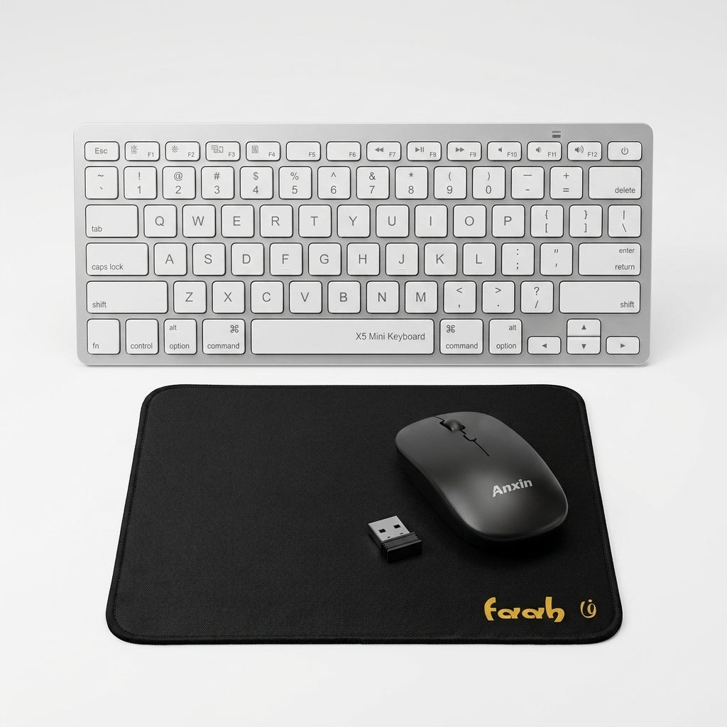 A wireless computer setup on a light gray background, featuring a silver mini keyboard, a black mouse with the brand name 'Anxin' printed on it, and a black mousepad with the brand name 'farah' printed in yellow.