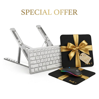 A promotional product shot on a white background showing a silver wireless keyboard, a clear adjustable stand, a black mouse pad with a rainbow-edged mouse, and a black gift box tied with a gold ribbon. Gold text at the top reads 'SPECIAL OFFER'.